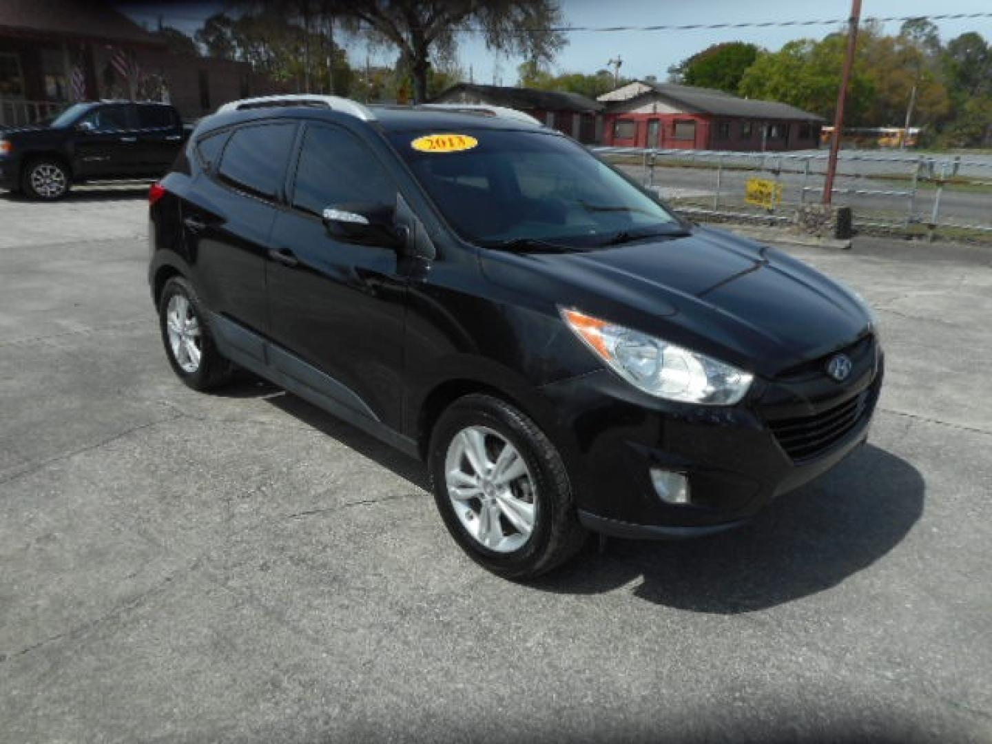 2013 BLACK HYUNDAI TUCSON GLS; LIMITED (KM8JU3AC9DU) , located at 1200 Cassat Avenue, Jacksonville, FL, 32205, (904) 695-1885, 30.302404, -81.731033 - Photo#5